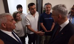 Bakan Kemal Memişoğlu Melih Meriç'i hastanede ziyaret etti
