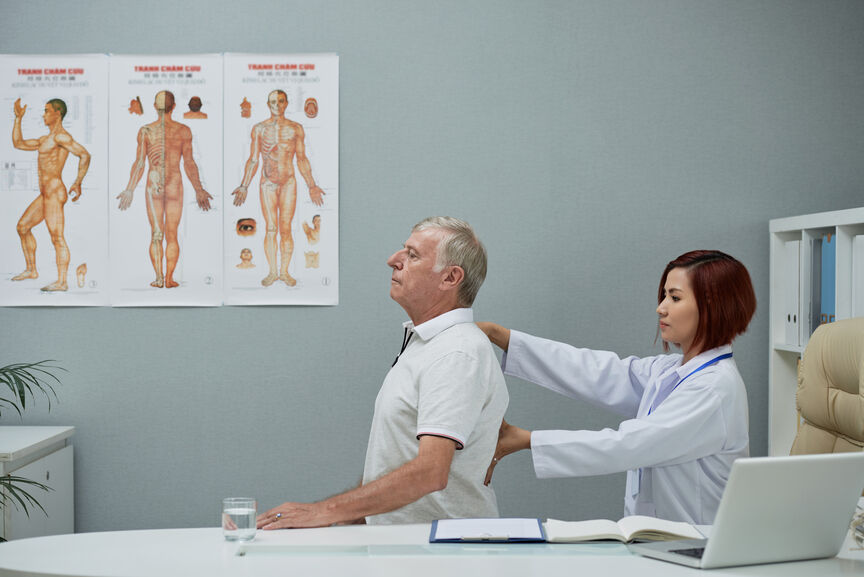 Chiropractor Checking Spine (1)